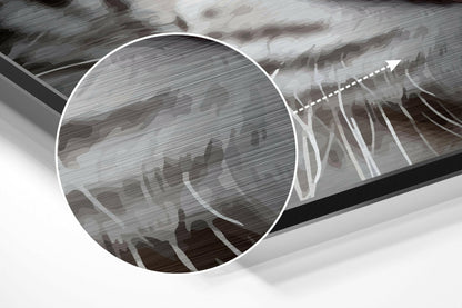 Close-up angled view of brushed aluminum wall art showing white tiger face detail with metallic surface texture and dimensional depth.