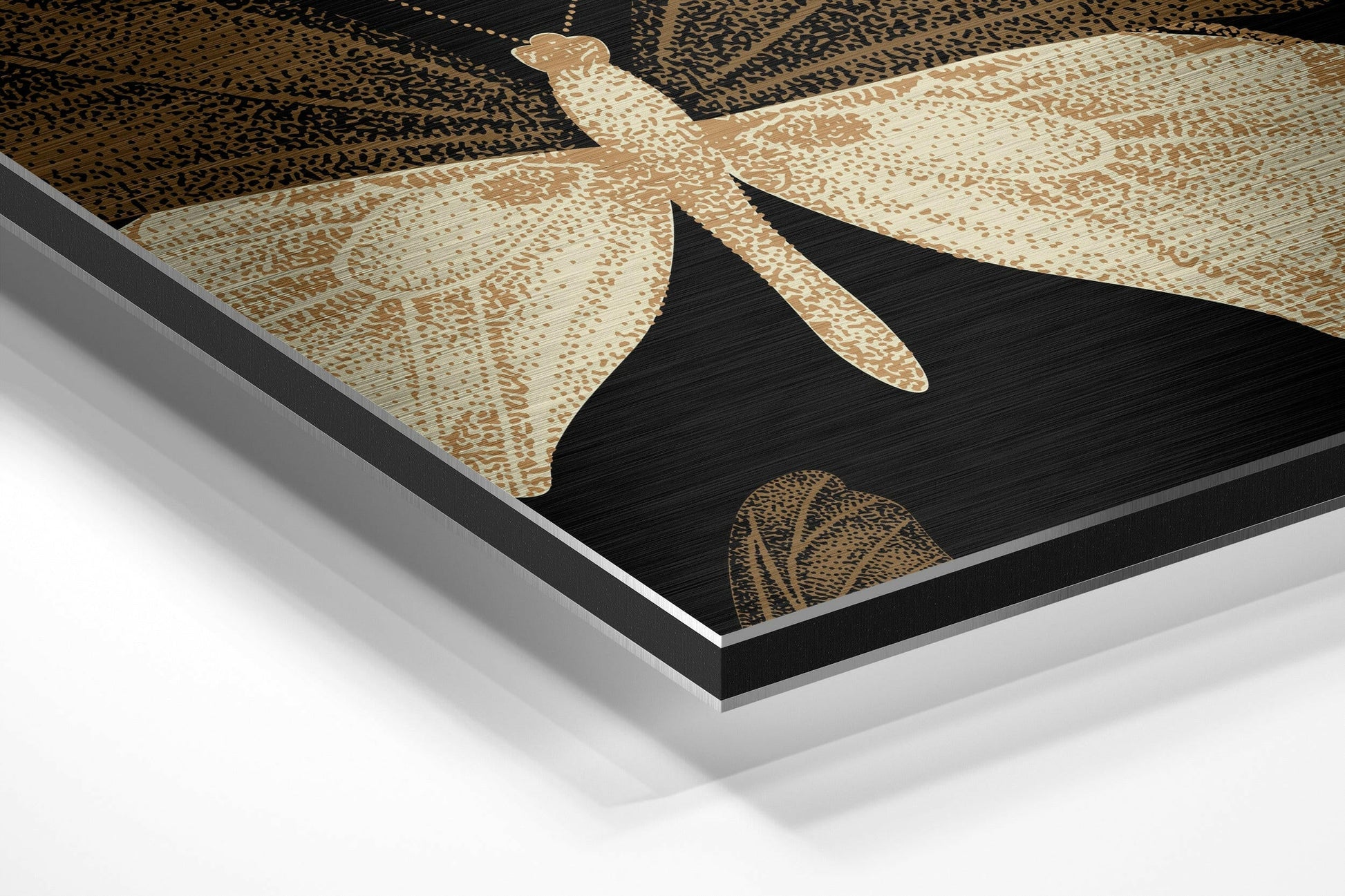 Angled close-up view of brushed aluminium wall art featuring tan and cream butterflies with detailed patterns on black background.