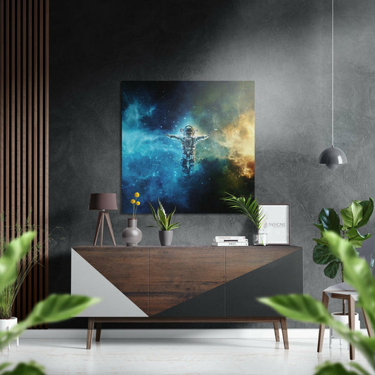 Modern living room with astronaut nebula wall art hanging above wooden dresser, flanked by potted plants and pendant lamp.