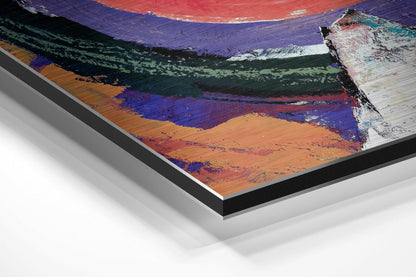 Close-up angle view of layered Dibond panel showing multicolored abstract brushstrokes in blue, orange, purple, and green with visible edge profile.