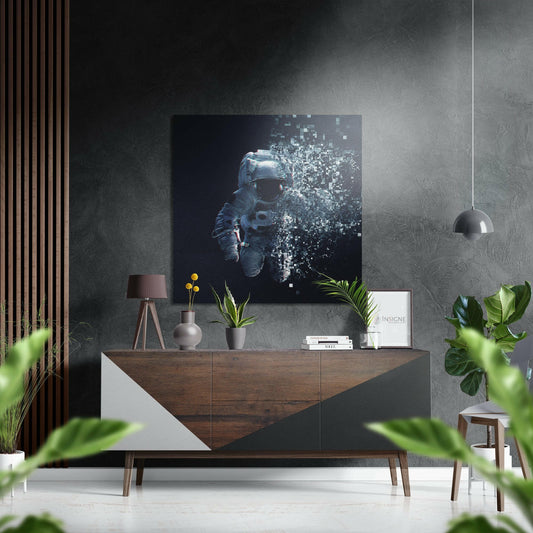 Modern living room interior featuring pixel dissolving astronaut wall art above wooden dresser with potted plants and pendant lighting.