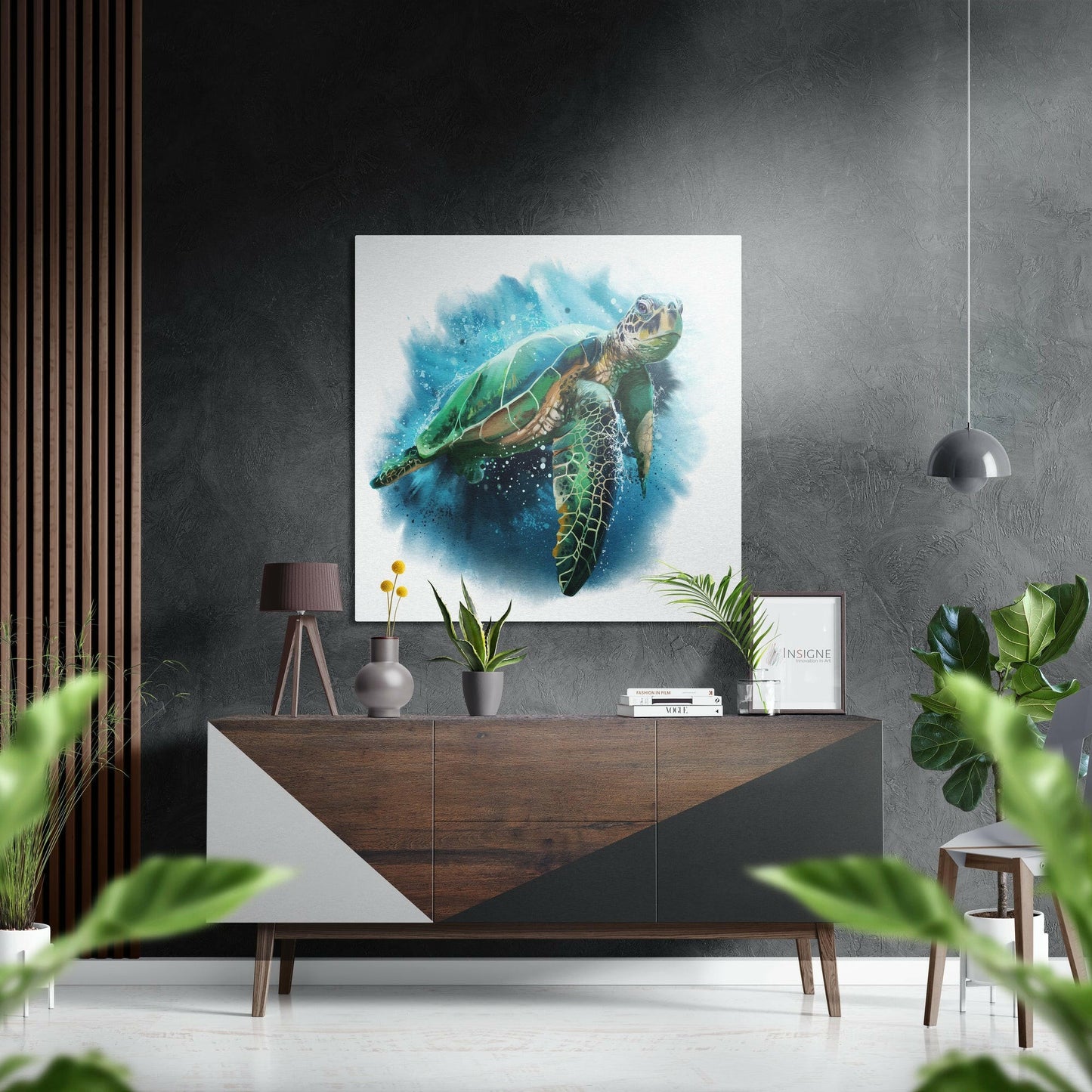 Sea turtle artwork displayed above wooden dresser in modern interior with potted plants and pendant light.