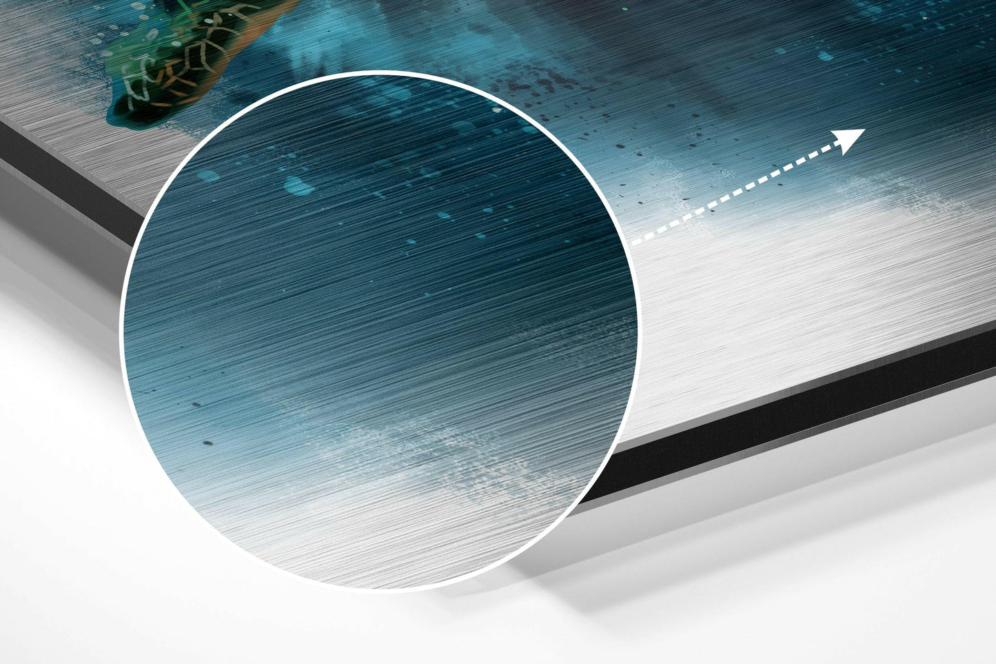 Isometric view of circular brushed aluminum Dibond wall art with turtle motif in upper left, directional arrow accent on right, teal and white color gradient.