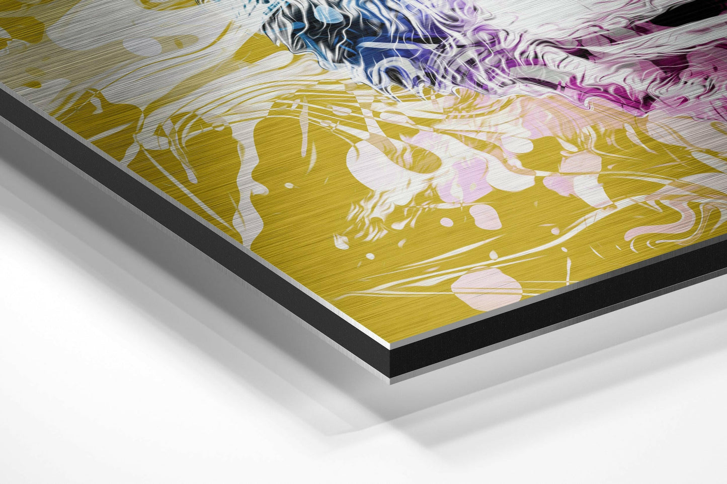 Close-up angled view of brushed aluminium Dibond wall art showing layered edges with yellow, blue, and purple fluid abstract artwork on textured surface.