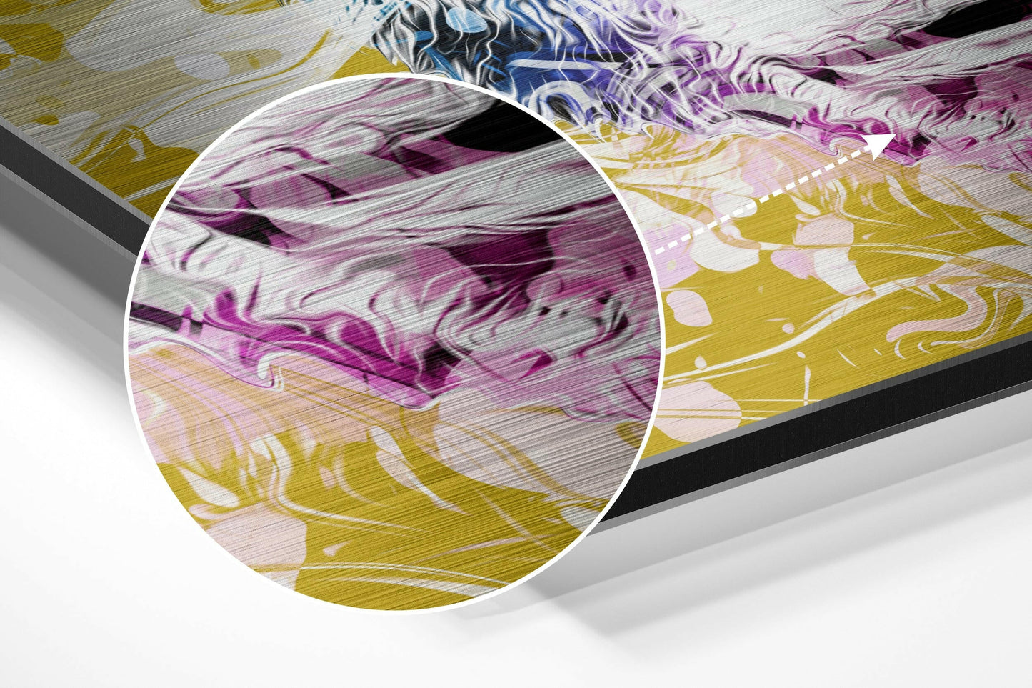 Close-up detail view of brushed aluminium surface showing purple, gold, and white marbled abstract pattern with textured finish.
