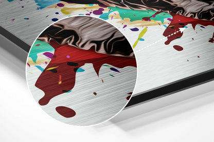 Angled perspective view of brushed aluminum wall art featuring a colorful dog silhouette with confetti and abstract design elements.