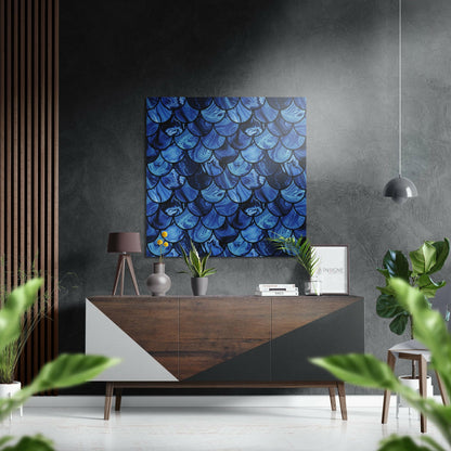 Blue iridescent scale-patterned Dibond wall art hanging above a wooden console table in a modern interior setting.