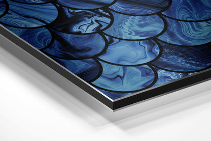 Close-up angled view of blue abstract brushed aluminium Dibond wall art showing layered black-outlined curved shapes with swirling texture patterns.