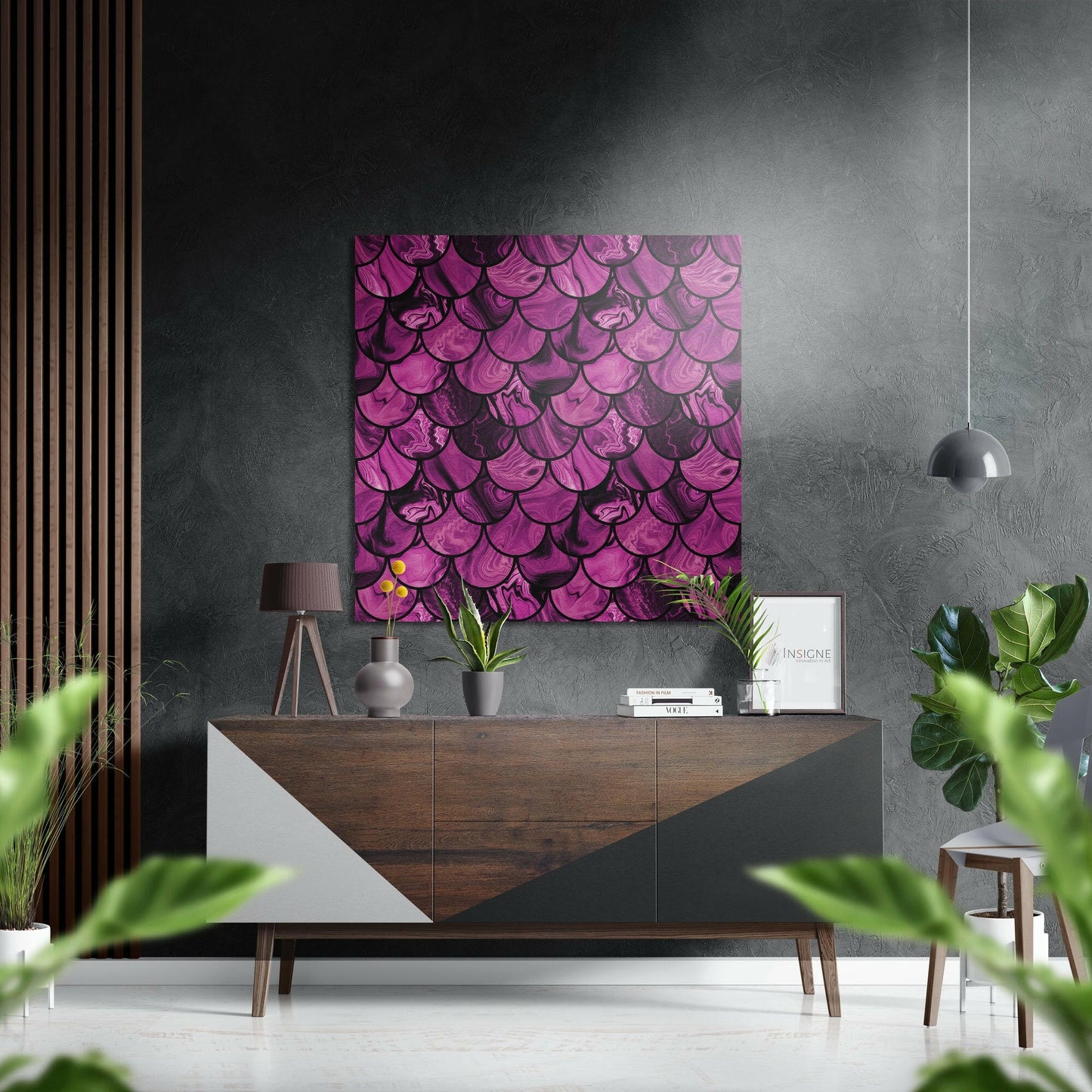 Pink Drops Brushed Aluminium Dibond Wall Art displayed above a wooden credenza in a modern interior with grey textured walls and green plants.