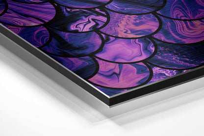 Angled perspective view of purple and blue fluid abstract wall art on brushed aluminum with black border frame.