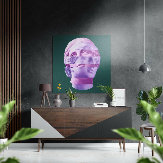 Modern living room featuring pink and purple gradient sculptural head artwork on teal background above wooden dresser.