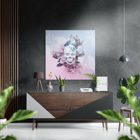 Modern interior scene featuring a skull artwork with pink roses and blue butterflies displayed above a wooden dresser with decorative items.