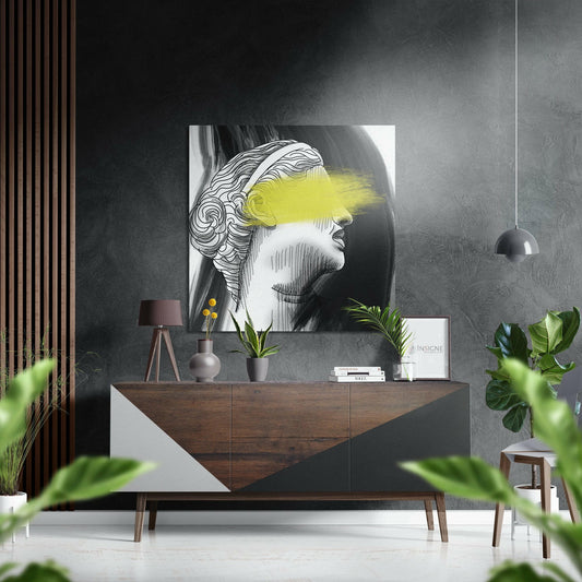 Modern interior scene featuring a mid-century wooden dresser displaying the yellow brushed aluminium wall art depicting a profile portrait with yellow and black ink detailing above.
