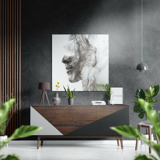 Smoked face brushed aluminium Dibond wall art featuring abstract charcoal portrait displayed above mid-century wooden dresser in modern interior setting.
