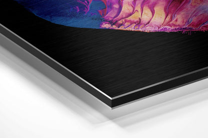 Angled perspective view of brushed aluminum composite panel with vibrant blue, purple, and pink fluid art design on black surface.