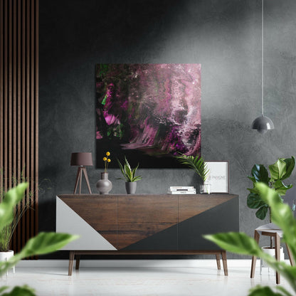 Modern living room styled display showing purple and magenta abstract brushed aluminium wall art above wooden credenza with decorative accessories and green plants.