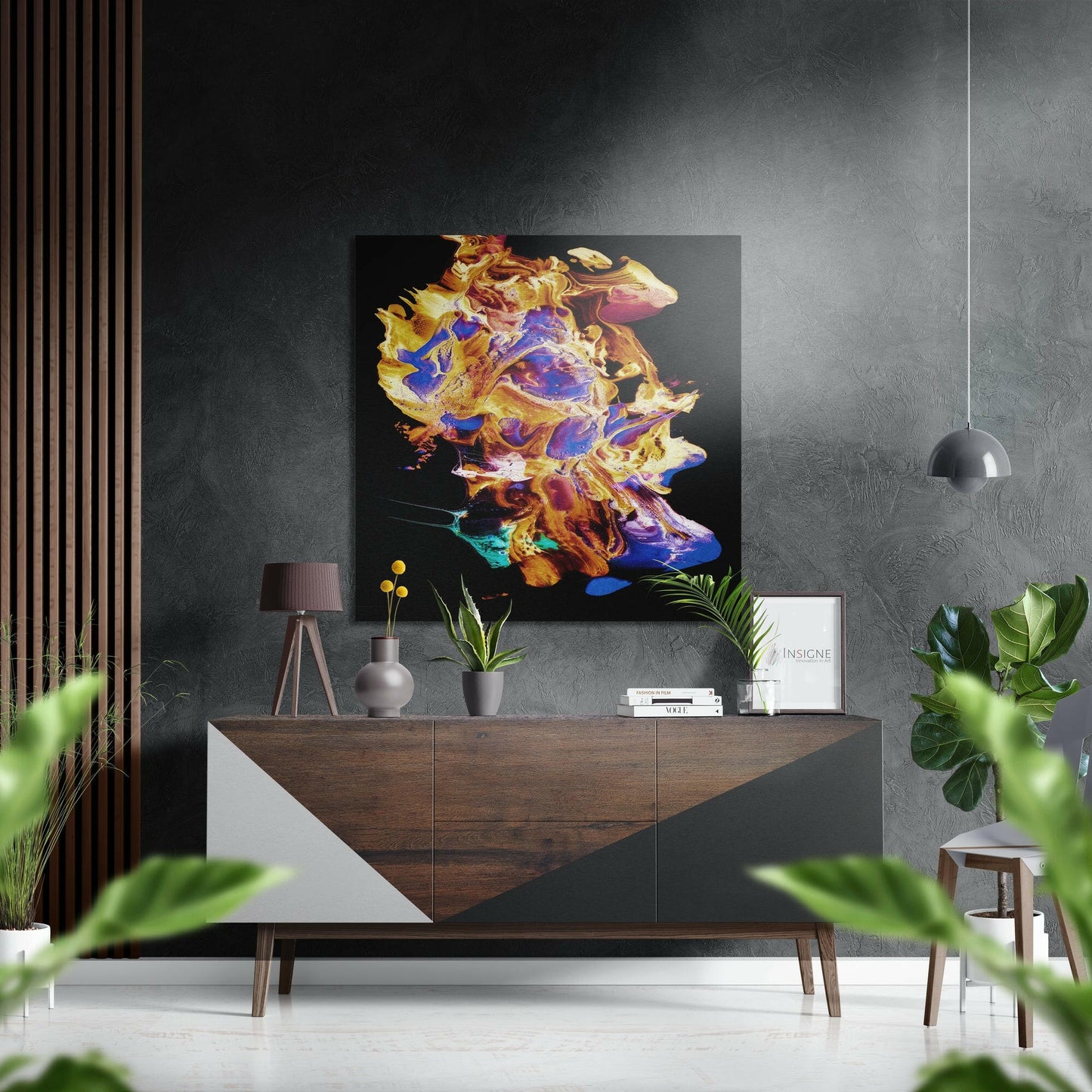 Modern living room interior featuring vibrant abstract yellow, blue, and purple brushed aluminium artwork displayed above a wooden mid-century dresser.