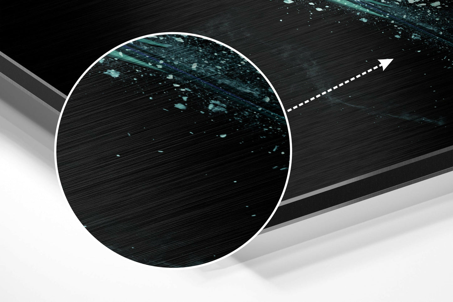 Close-up detail of brushed aluminum surface with teal digital particles and directional arrow on dark background.