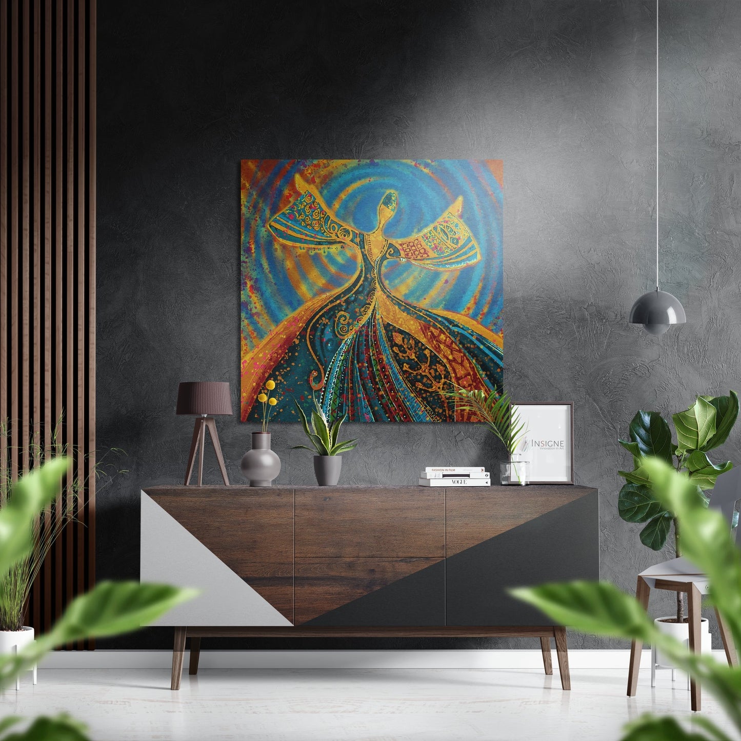 Colorful Dervish Brushed Aluminium Dibond wall art featuring a whirling figure in blue, gold, and red tones displayed above a wooden dresser in a modern interior setting.