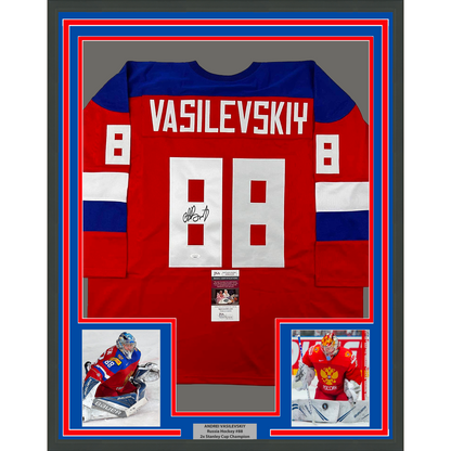Framed red Team Russia hockey jersey with "VASILEVSKIY" and number 88 displayed with two player photographs and JSA authentication certificate.