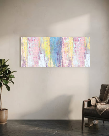 Colorful painted wood glass wall art displayed horizontally above a chair in a minimalist room with pink, yellow, and blue vertical stripes.