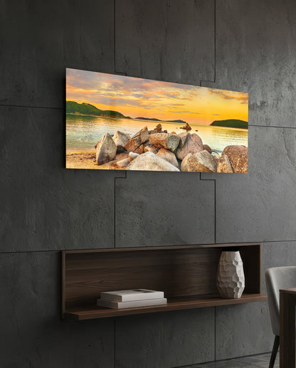 Boulder Pile Golden Sunset Bay Glass Wall Art