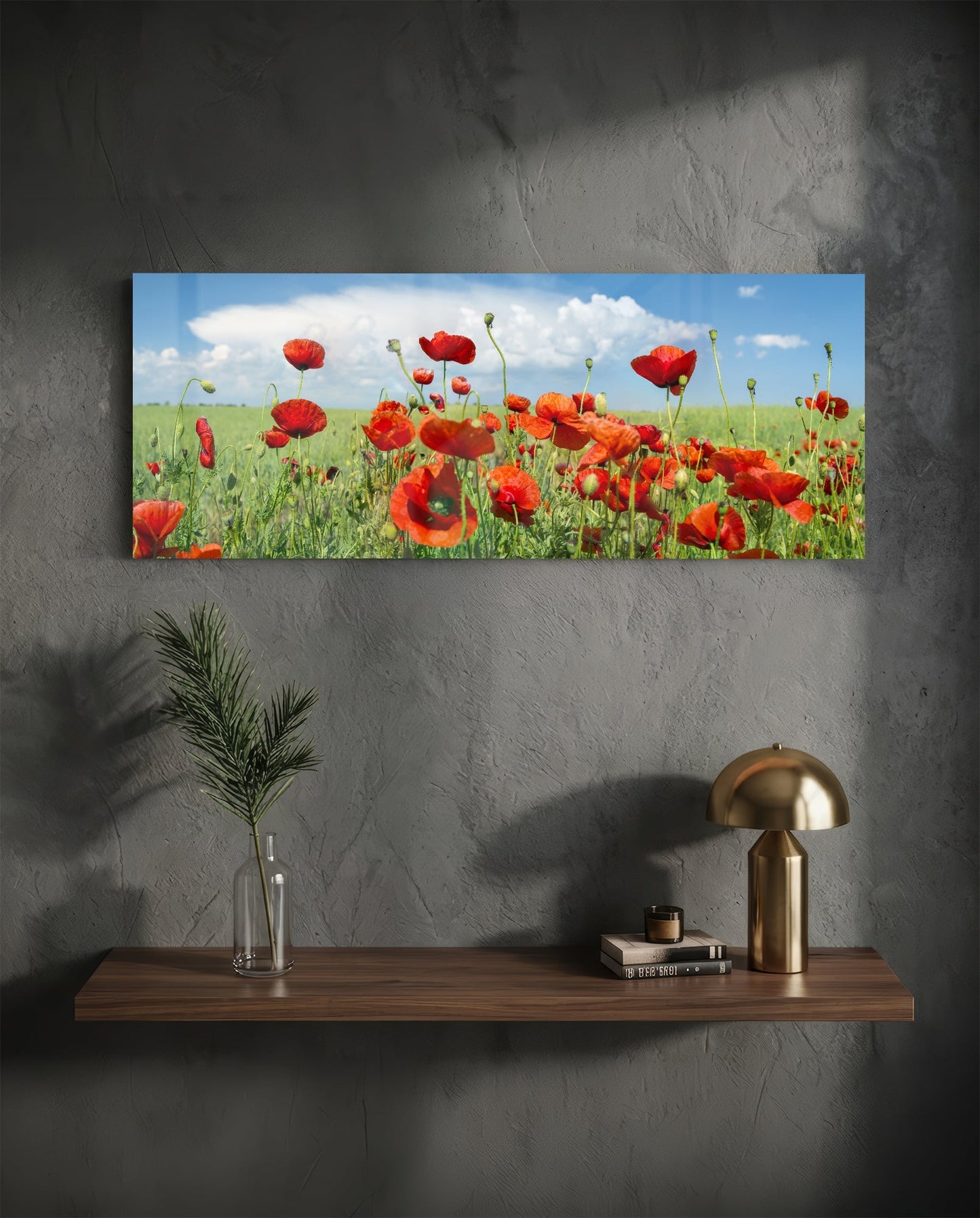 Poppy Flower Glass Wall Art hanging above wooden shelf with potted plant, lamp, and books in minimalist interior setting.