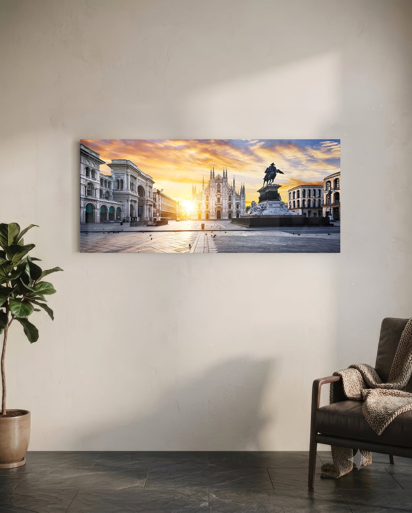 Medieval Glass Wall Art displaying Milan's Duomo cathedral at golden sunset, mounted on white wall above leather chair.