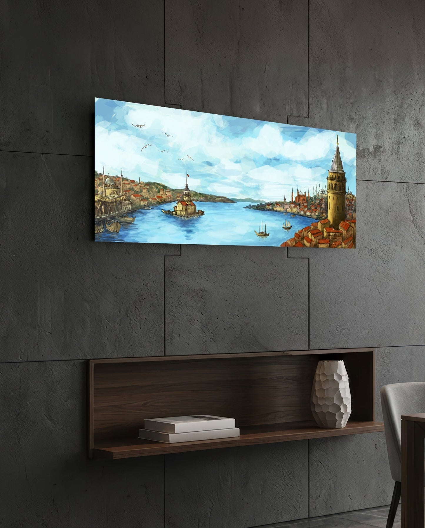 Horizontal glass wall art depicting Istanbul's waterfront with blue water, golden towers, and sailing boats, mounted on concrete wall above wooden shelf.