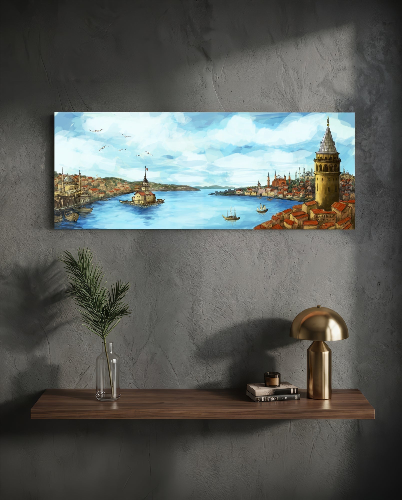 Panoramic glass wall art depicting Istanbul's Golden Horn with Galata Tower, mounted above wooden shelf with brass lamp and greenery.