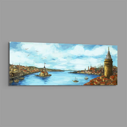 Horizontal glass wall art depicting a panoramic watercolor painting of Istanbul with the Golden Horn, mosques, the Galata Tower, traditional buildings, boats, and blue sky with clouds.