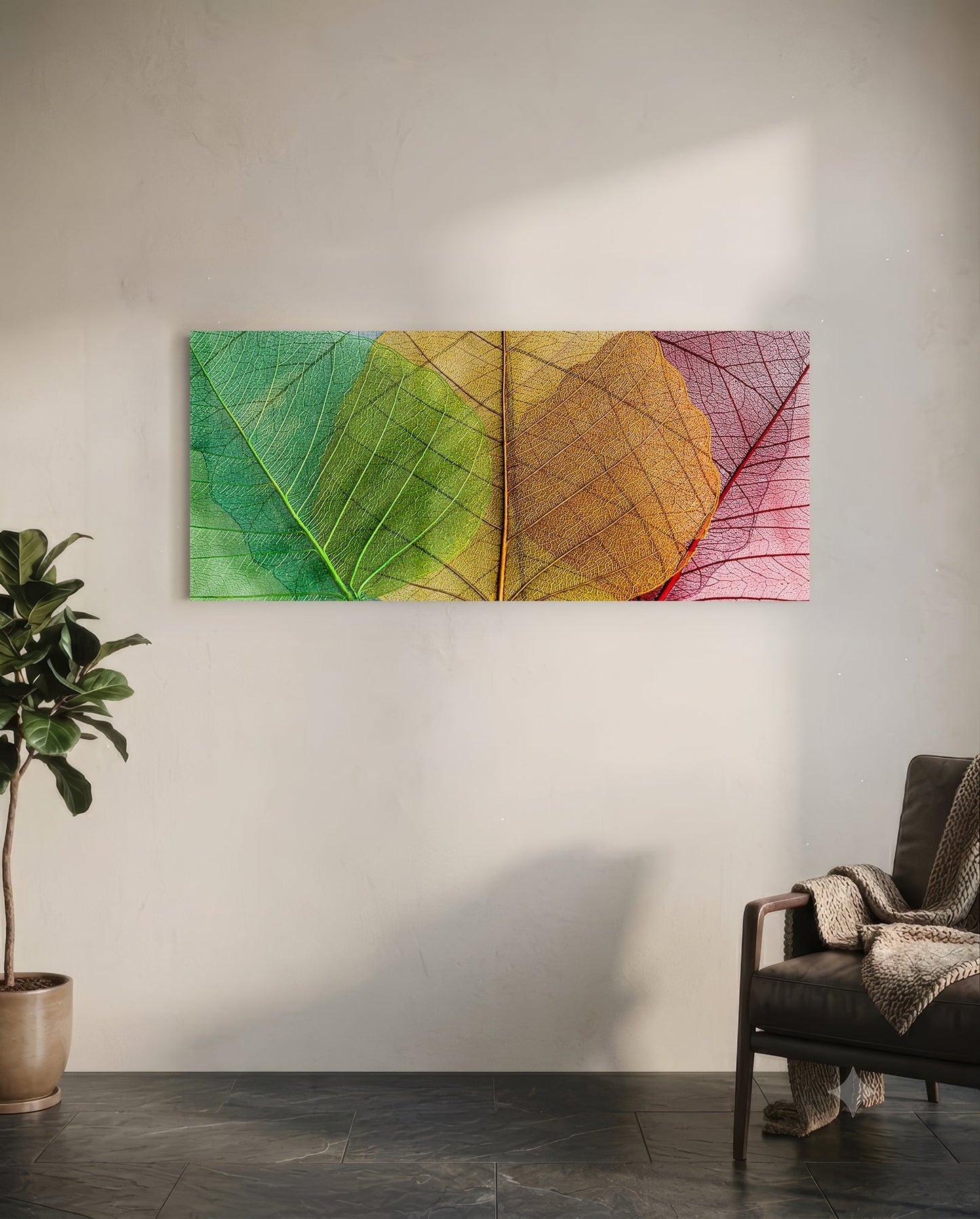 Colorful glass wall art featuring translucent leaves in gradient rainbow hues displayed in modern living room interior.