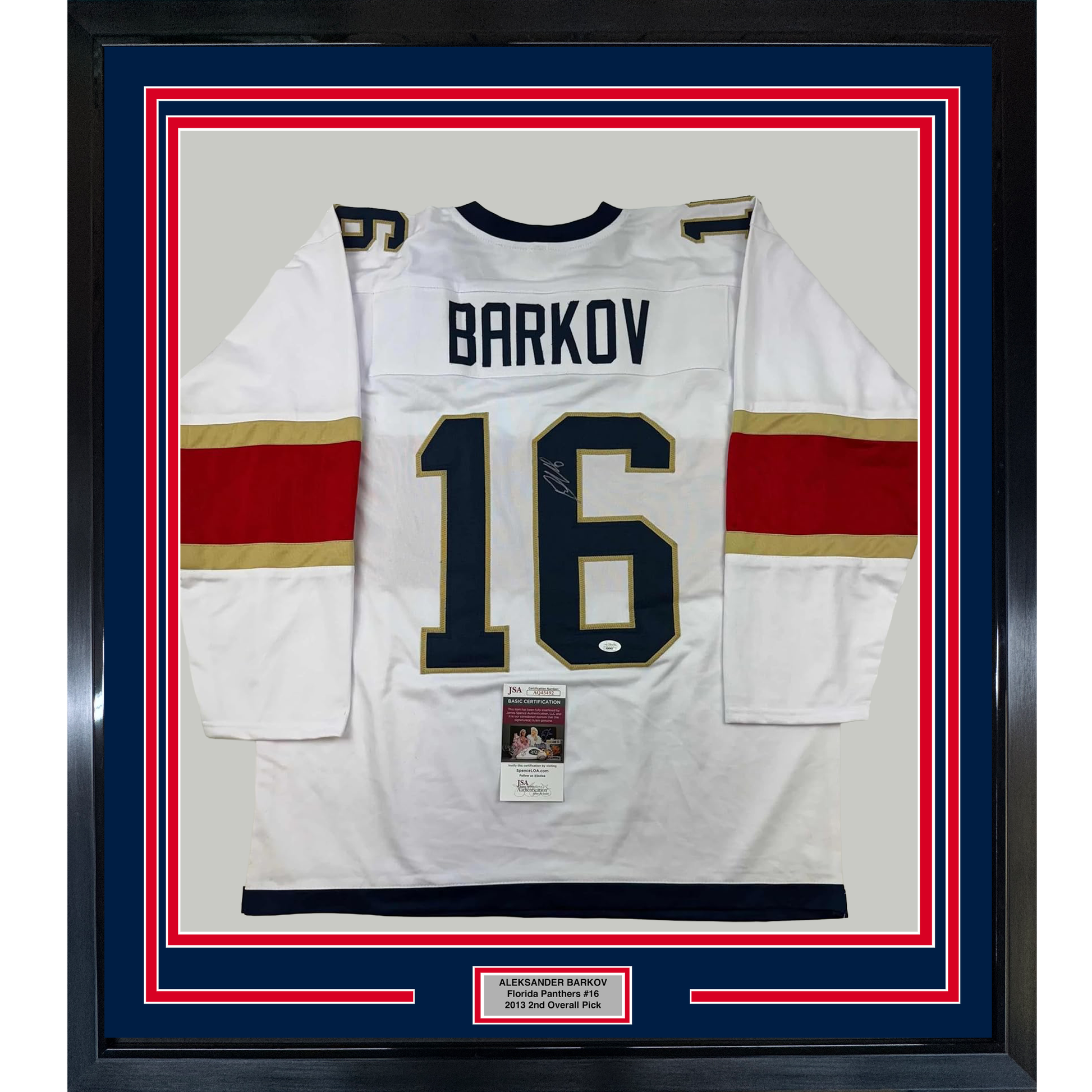 White Florida Panthers hockey jersey number 16 with "BARKOV" nameplate, signed, displayed in blue and red frame with JSA certification label.