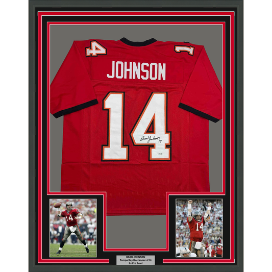 Framed red Tampa Bay Buccaneers jersey number 14 signed by Brad Johnson, displayed with two accompanying photos and nameplate.