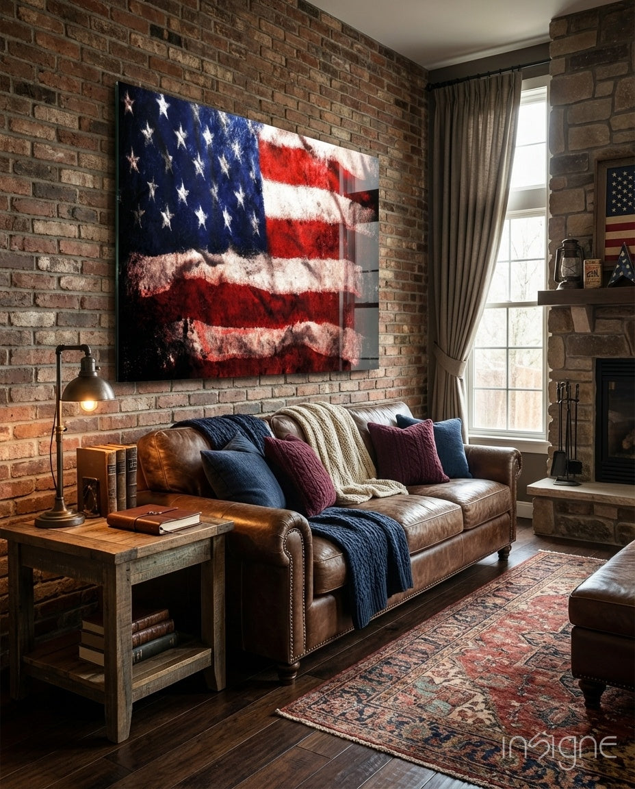 USA Flag Glass Wall Art displayed above brown leather sofa in brick fireplace living room setting.