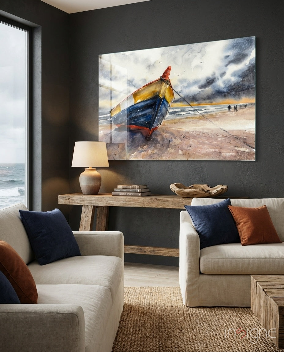 Solo Canoe Glass Wall Art displayed above wooden console in modern coastal living room with cream furniture and ocean view.