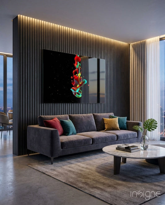 Red and teal abstract splash art displayed on black glass mounted above gray sofa in modern living room with city views.