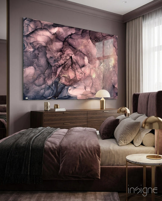 Dusky Mauve Ink Flow Glass Wall Art mounted above a wooden dresser in a modern bedroom with mauve walls and brass accents.