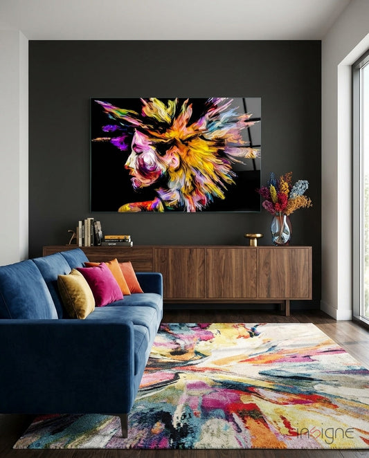 Colorful glass wall art depicting a vibrant profile with spiky hair displayed above wooden media console in modern living room.