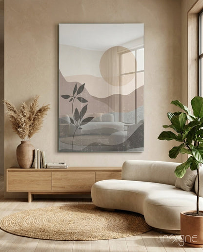 Small Leaves Glass Wall Art displayed above wooden dresser in beige minimalist living room with cream curved chair and potted plants.