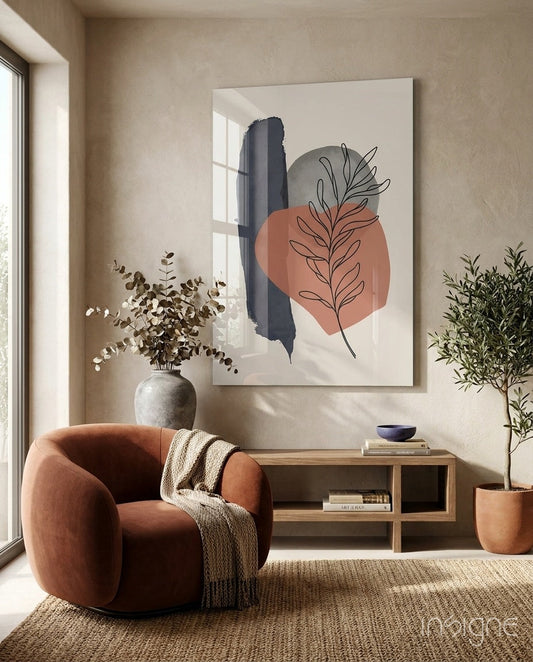 Modern living room with terracotta and navy abstract leaf artwork displayed above wooden shelf, beside potted plants and rust-colored chair.