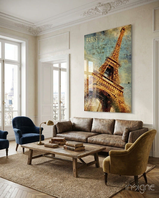 Golden Grunge Paris Eiffel Tower glass wall art displayed above a brown leather sofa in a classical Parisian apartment interior.