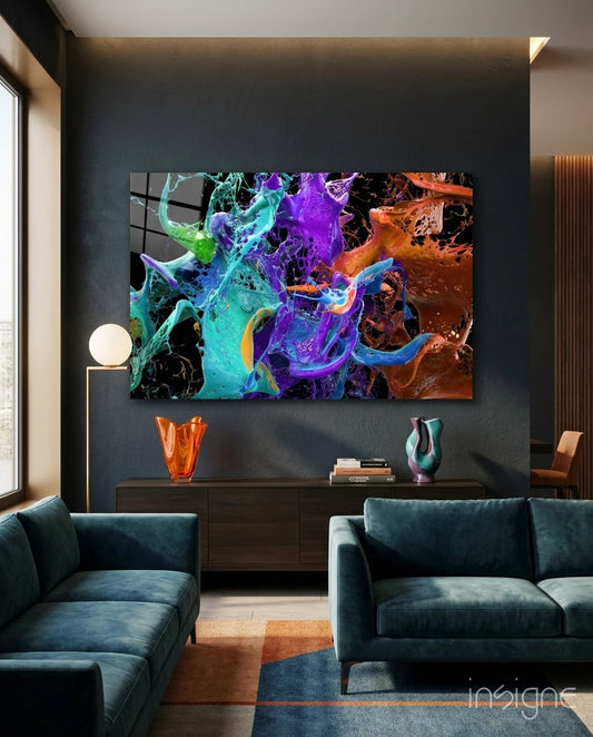 Vibrant teal, purple, and orange paint splash glass art displayed on dark wall above console table in modern living room.