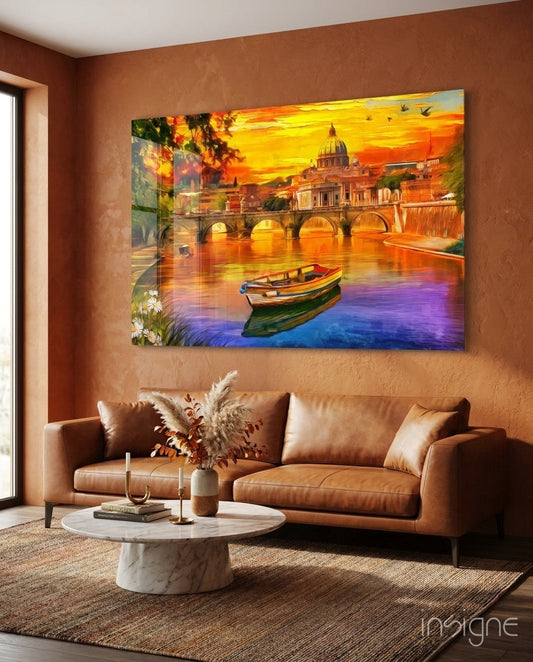 St. Peter's Basilica glass wall art displayed above a cognac leather sofa in a rust-colored living room with warm sunset tones.