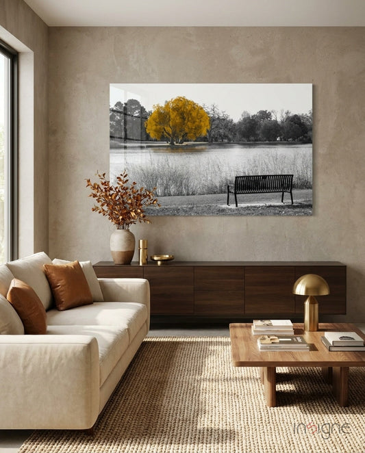 Yellow Tree Glass Wall Art displayed above a dark wood sideboard in a modern living room with beige walls and cream furniture.