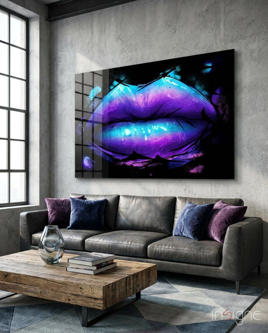 Purple and turquoise galaxy-painted lips glass wall art hanging above gray sofa in modern loft interior.