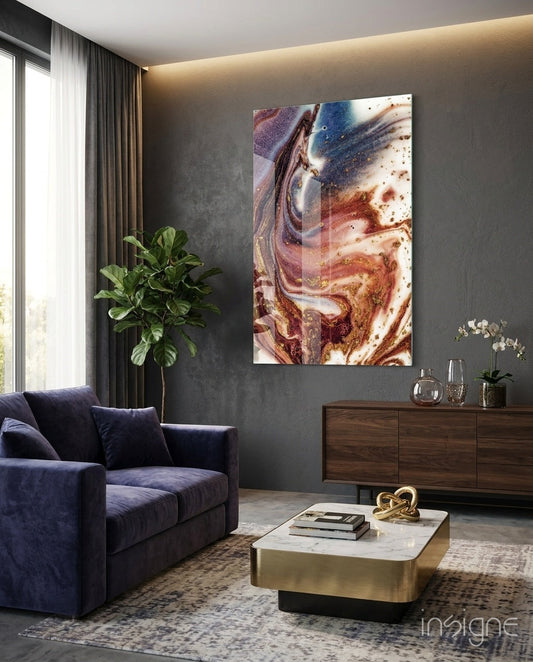 Purple, copper, and blue swirled marble glass wall art hanging in contemporary living room above wooden dresser.