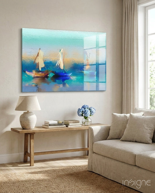 Turquoise sailboat canvas art hanging above wooden console table in neutral living room with beige sofa and window.