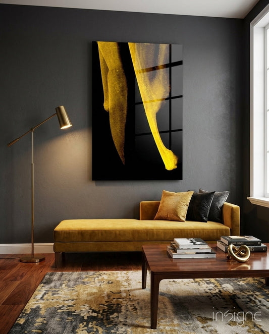 Modern living room with mustard yellow sofa displaying abstract yellow and black wall art above, brass floor lamp beside.