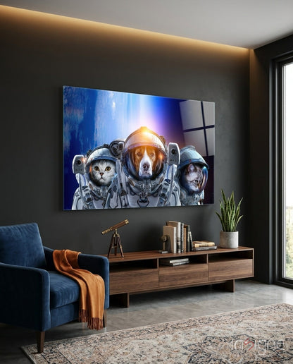 Space Team glass wall art displaying three animals in astronaut suits displayed above wooden media console in modern living room.